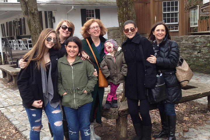 Lois with visiting family group in Society Hill